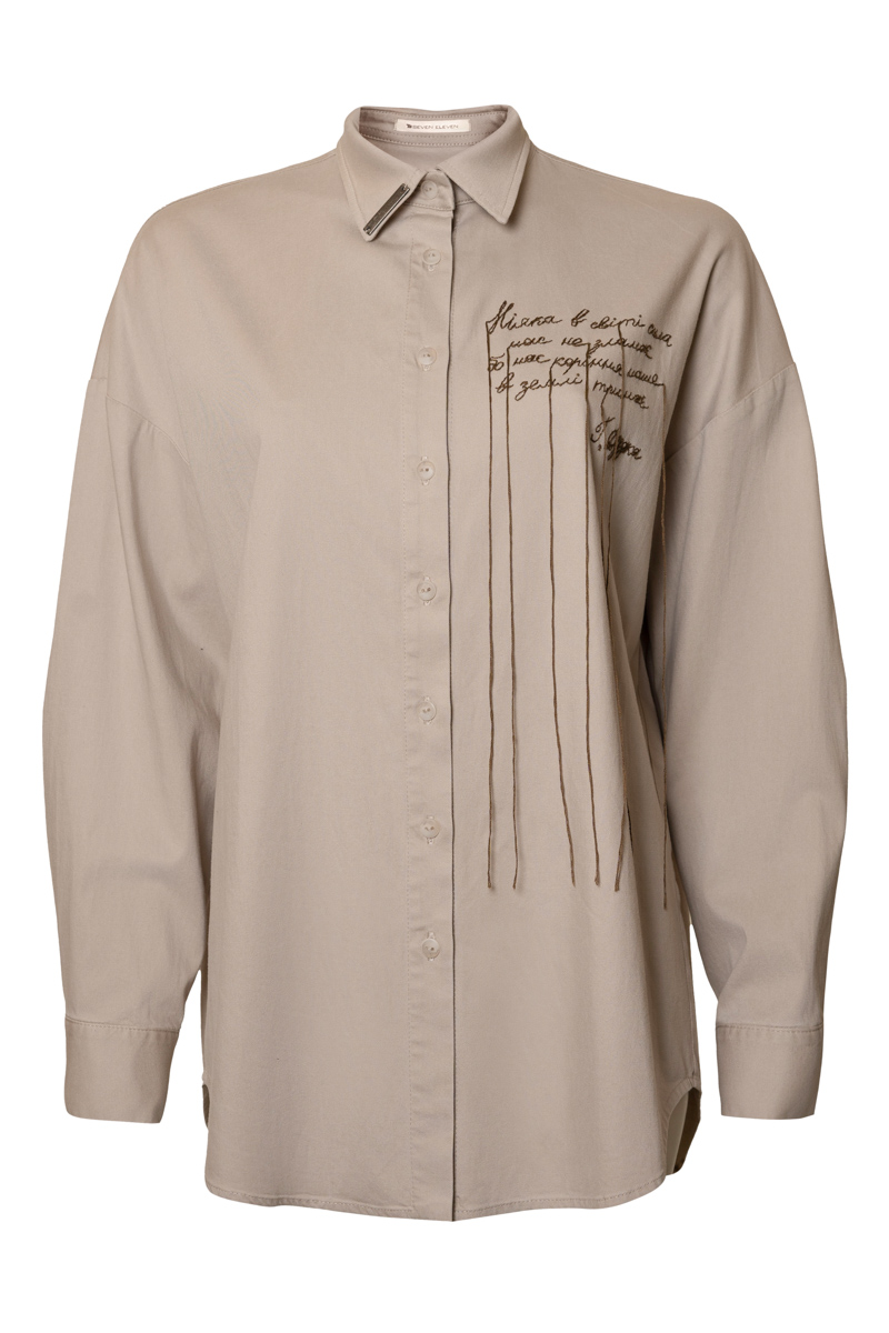 Oversized beige shirt with embroidery photo
