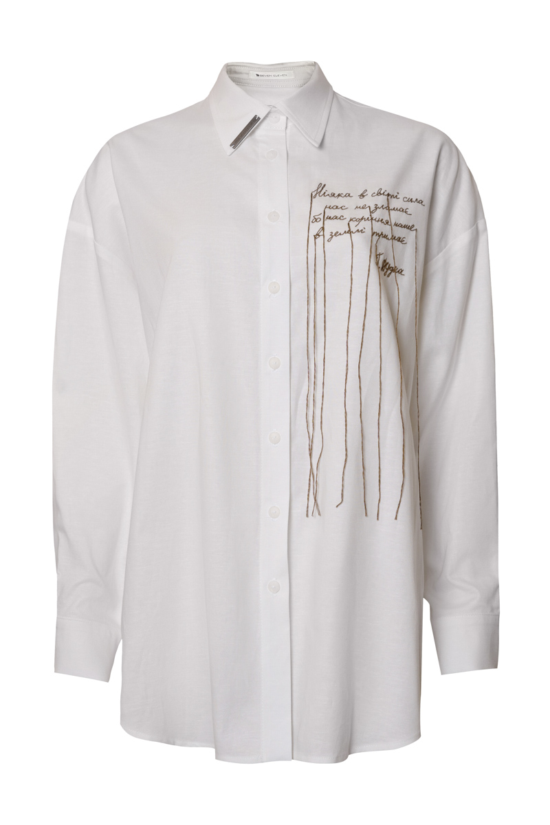 Oversized white shirt with embroidery photo