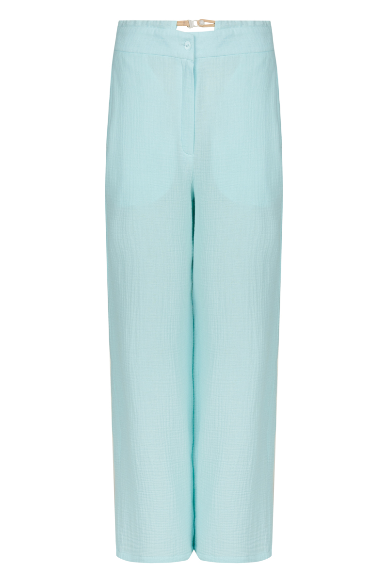 Light blue cotton trousers photo